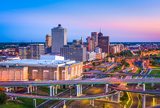 photograph of a city under a sunset