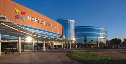 photograph of a building that has a large sign that says baptist health
