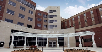 concave entrance of a brown building