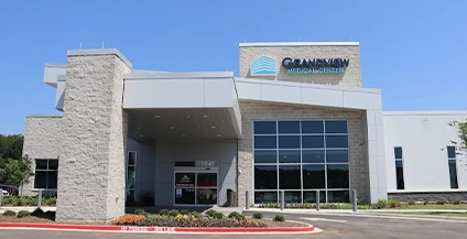 beautiful white building entrance with large window