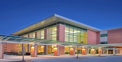 corner of a building illuminated at night