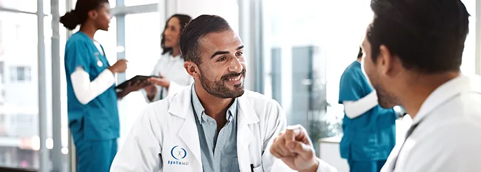 Young medical professionals speaking