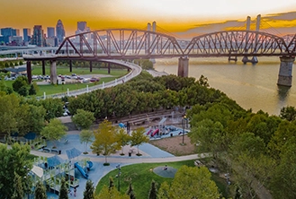 bridge over a river during sunset